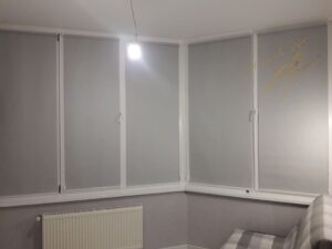 Рулонные шторы на лоджии с тканью Luminis T01 Grey